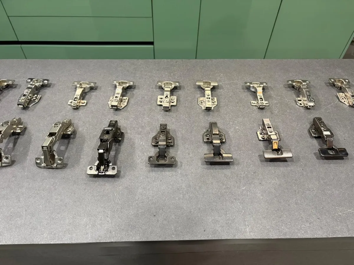 Concealed cabinet hinges on display at Sri Sri Plywoods